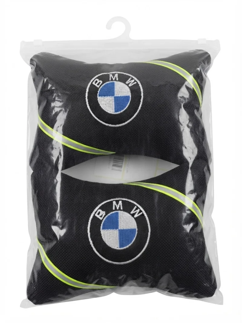 مخدات رأس للسيارة باللون الأسود وتصميم رياضي فاخر يحمل شعار BMW الشهير،